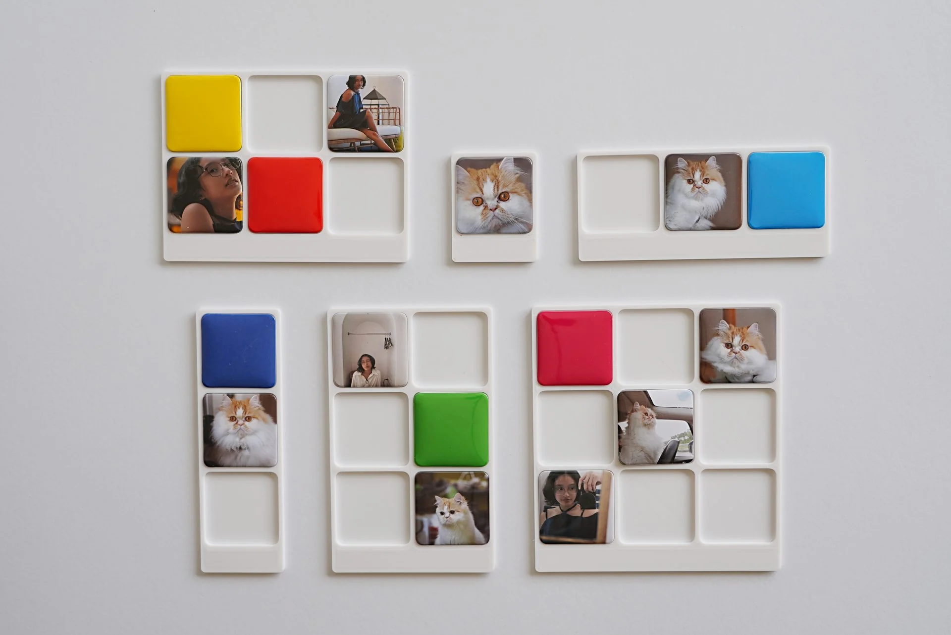 An early family of SariSari Snaps frames in several formats, fitted with colorful tiles and photographs.